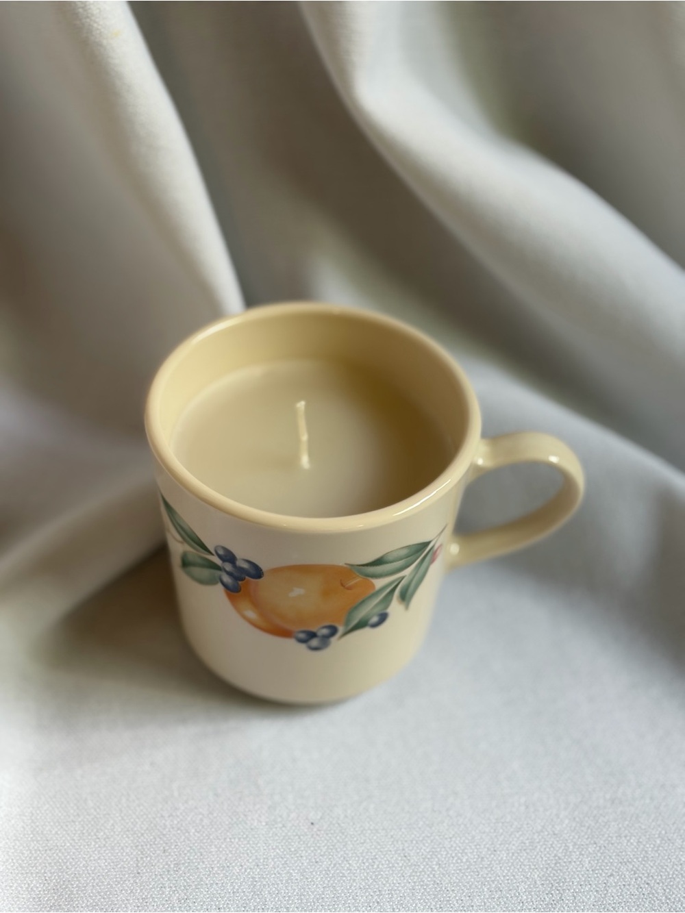 Tea tree scented teacup candle